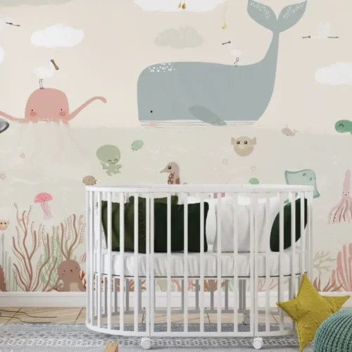 babykamer behang walvis achter wiegje in babykamer