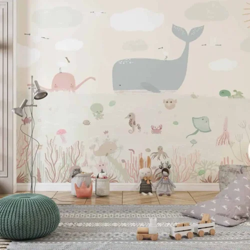 babykamer behang walvis achter vloerkleed en poef in kinderkamer