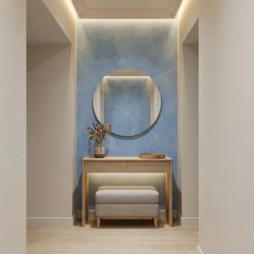 lichtblauw wolkachtig betonlook behang in de hal