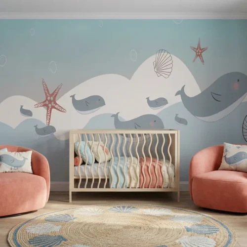 kinderkamer behang walvissen pastelblauw achter wieg en fauteuil in babykamer