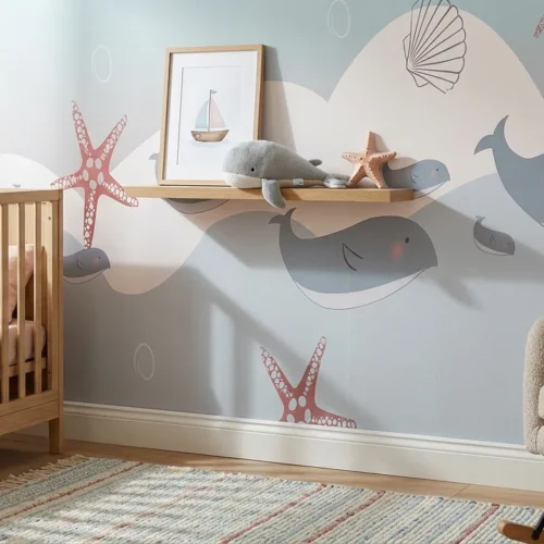 kinderkamer behang walvissen pastelblauw achter wieg in babykamer