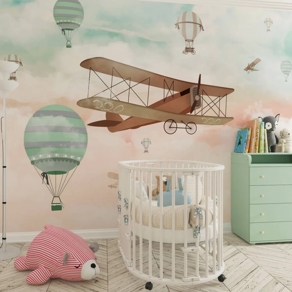 kinderkamer behang vintage vliegtuig pastel achter ronde wieg en commode in babykamer