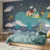 kinderkamer behang walvis blauw achter bed in kinderkamer